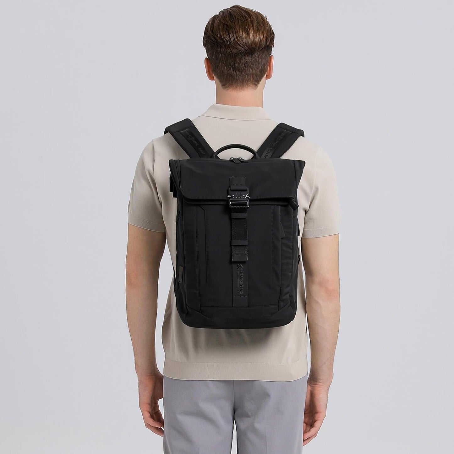 Model showcasing the Kingsons business backpack KS3318w