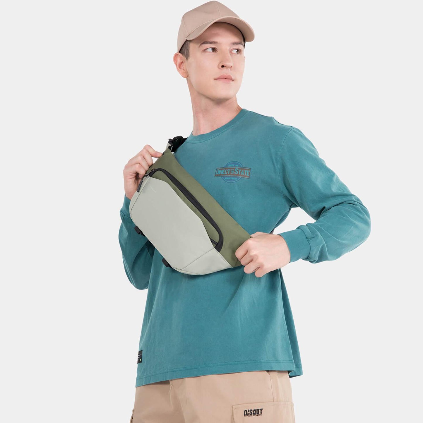 Model showcasing the Kingsons sling bag ks3307w green